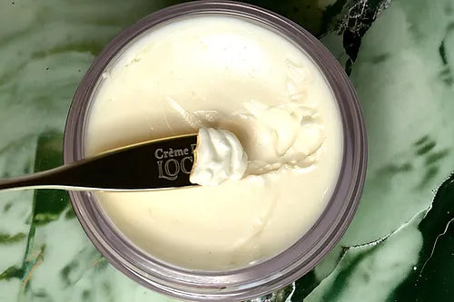 Crème Du Loch Ritual Set contents laid flat – serum, moisturiser, eye concentrate, balm